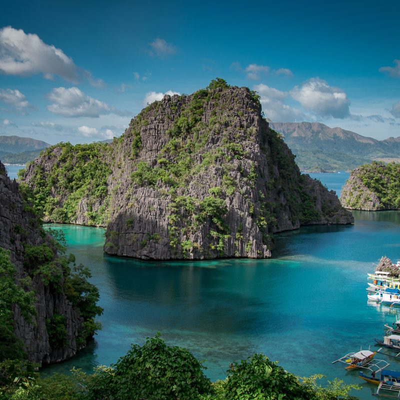 Karst islands and clear green water at Coron, Palawan.