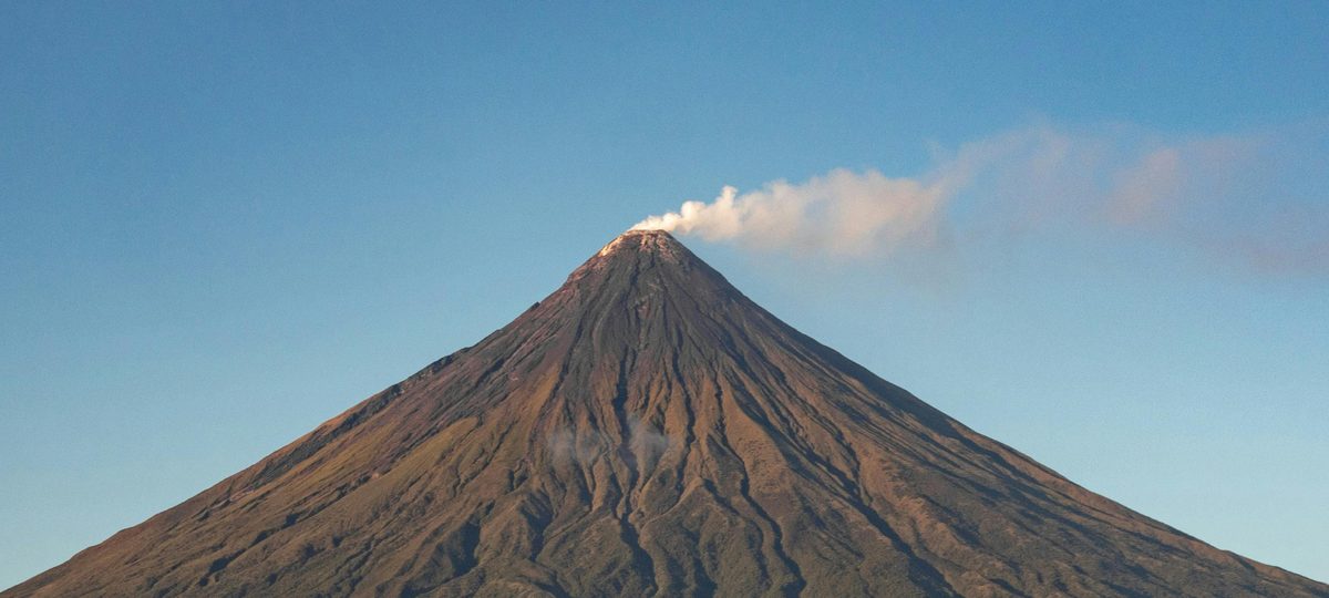 Mayon Volcano rising above Albay at first light.